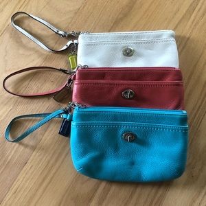 3 coach wristlets